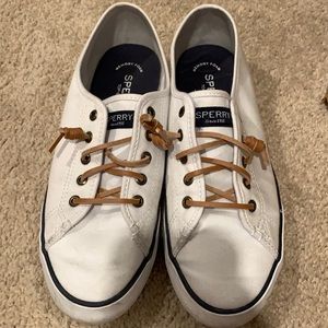 Sperry slip on white sneakers. Only worn a few times. Good condition